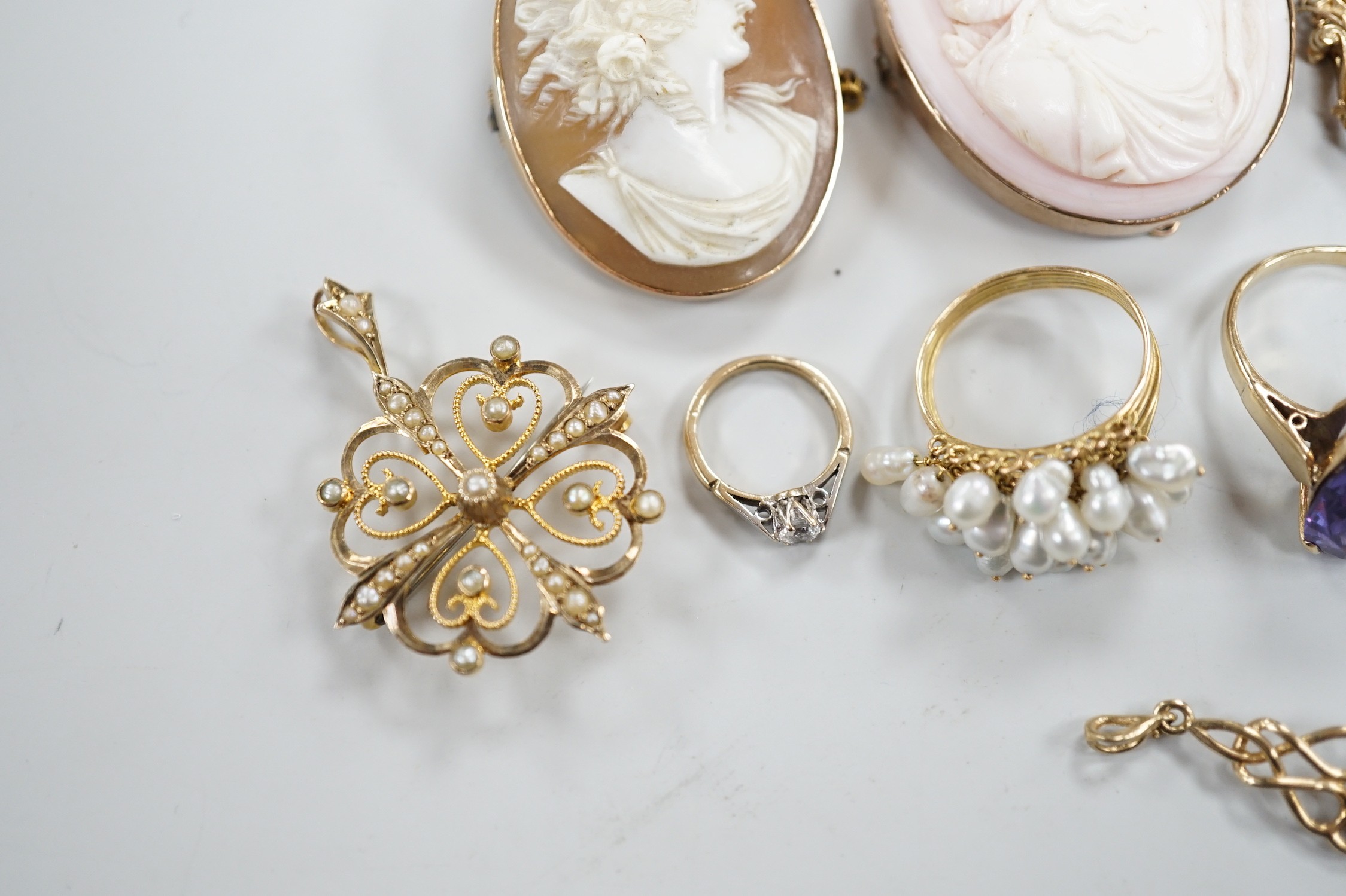 Mixed jewellery including two yellow metal mounted cameo shell brooches, one stamped 9c, two 9ct gold rings and a 585 ring, four other yellow metal and gem set rings and four pendants including two 9ct, one inscribed 'Di